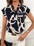 Printed Tie Neck Cap Sleeve Blouse